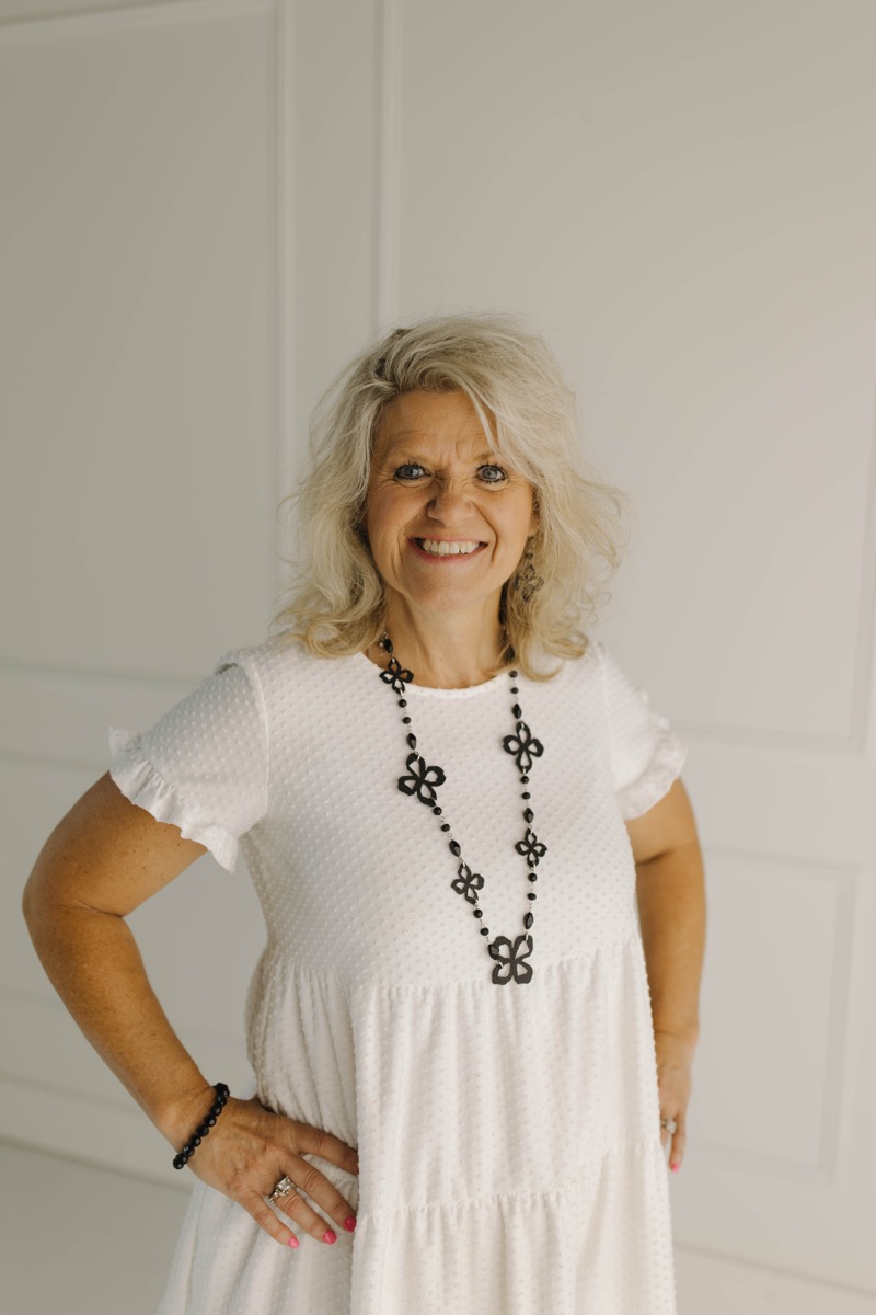 A portrait of Marsha Bilderback, smiling.